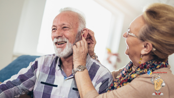 two old peson wearing hearing aid